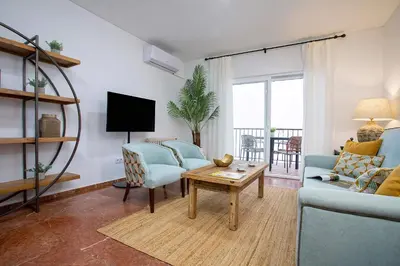 Una televisión o centro de entretenimiento en Genteel Home Avenida América Córdoba