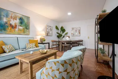 Una televisión o centro de entretenimiento en Genteel Home Avenida América Córdoba
