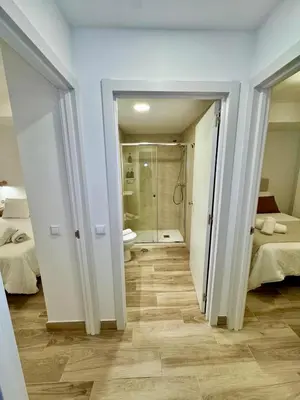 Cama o camas de una habitación en Puerta Sevilla