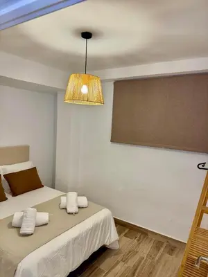 Cama o camas de una habitación en Puerta Sevilla