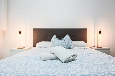 Cama o camas de una habitación en Algaba Huelva alto