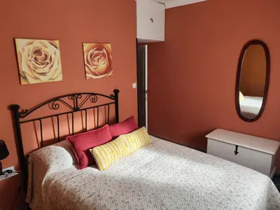 Cama o camas de una habitación en El Andén del Hueznar