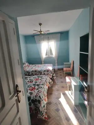 Cama o camas de una habitación en El Andén del Hueznar