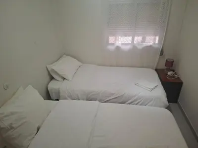 Cama o camas de una habitación en Confortable piso en Puertollano