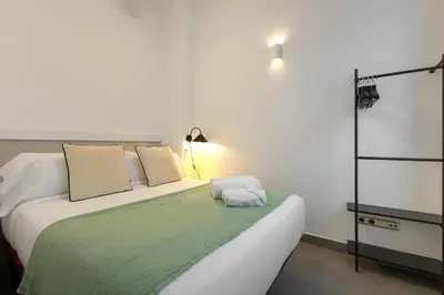 Cama o camas de una habitación en ISG Apartments Palacios Malaver 23