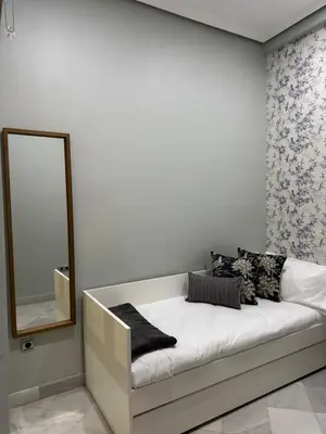 Cama o camas de una habitación en Makao Alameda 2 BR Apartment