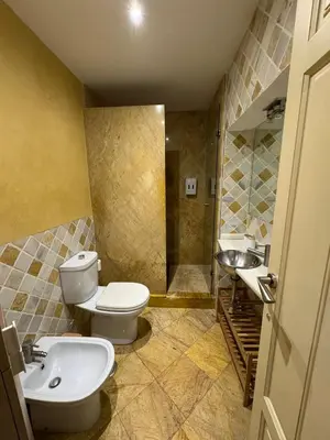 Un baño de Makao Alameda 2 BR Apartment