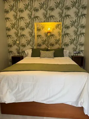 Cama o camas de una habitación en Makao Alameda 2 BR Apartment