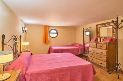 Cama o camas de una habitación en La Naranja Dulce CASA RURAL