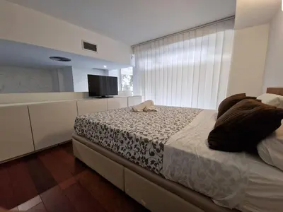 Cama o camas de una habitación en Exclusive designer apartment with private patio Matahacas bajo