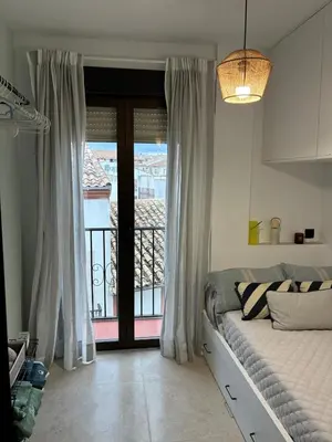 Cama o camas de una habitación en El Paseo de Baeza