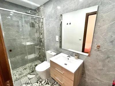 Un baño de Paradise Home