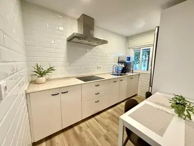 Una cocina o zona de cocina en Nervion Apartments Sevilla