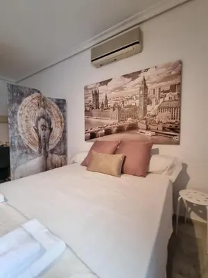 Cama o camas de una habitación en Estudio Alfalfa