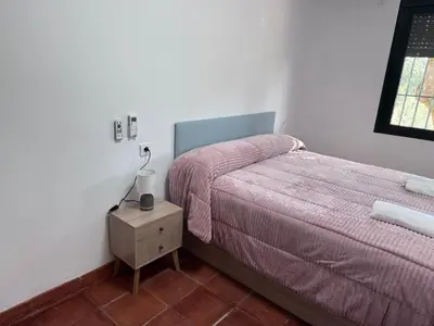 Cama o camas de una habitación en Dehesas Rojas