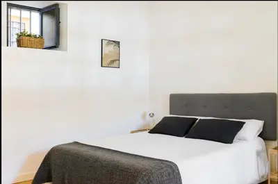 Cama o camas de una habitación en Conde Suite Courtyard by Valcambre