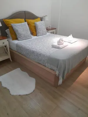 Cama o camas de una habitación en Luis Montoto Acogedor