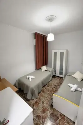 Cama o camas de una habitación en Apartamento EL LUCENTINO