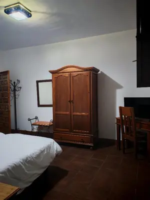 Cama o camas de una habitación en Hostal Casa Inés La Valerosa