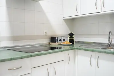 Una cocina o zona de cocina en AvantiStays Esencia de Sevilla