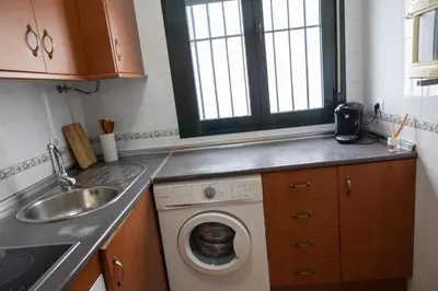Una cocina o zona de cocina en Loft Callejón del Ayre