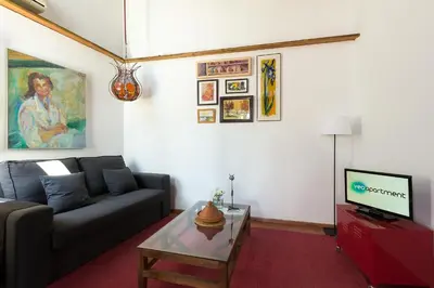 Una televisión o centro de entretenimiento en Veoapartment Ibarra Terrace
