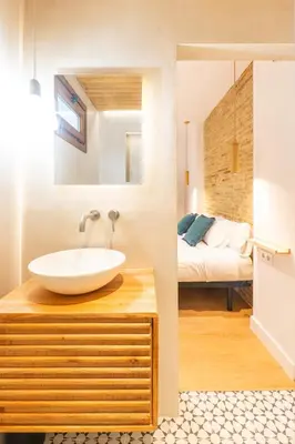 Cama o camas de una habitación en Pickman Suites