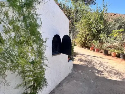 Jardín al aire libre en Casa rural con Starlink a 30 min de Málaga