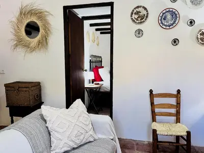 Zona de estar de Casa rural con Starlink a 30 min de Málaga