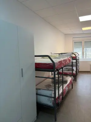 Cama o camas de una habitación en Albergue Rural Badolatosa