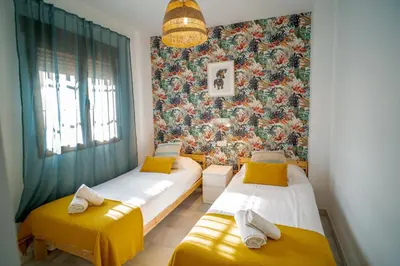 Cama o camas de una habitación en Wallada Patio Andalusí