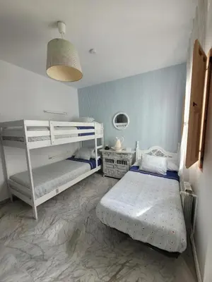 Cama o camas de una habitación en Hospejade cerca de la feria