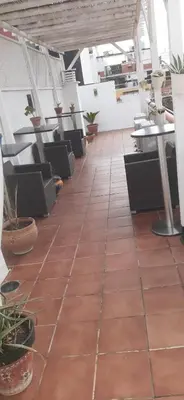 Un restaurante o sitio para comer en Hospejade cerca de la feria