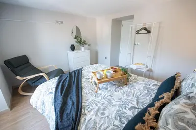 Cama o camas de una habitación en Casita con vistas a la montaña en Antequera