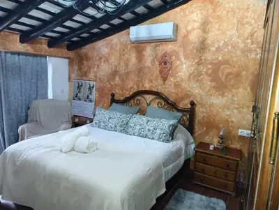 Cama o camas de una habitación en Villa Tara Los Arcos