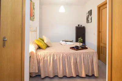 Cama o camas de una habitación en Casa Turística Patio Cordobés - Parking privado en la Judería