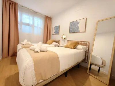 Cama o camas de una habitación en Cavestany Suites