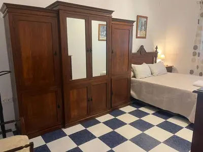 Cama o camas de una habitación en Casa para Grupos en Lucena Piscina Privada y Barbacoa 14 personas