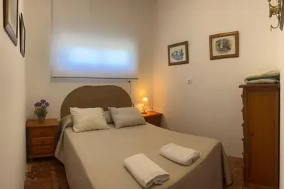 Cama o camas de una habitación en Casa para Grupos en Lucena Piscina Privada y Barbacoa 14 personas