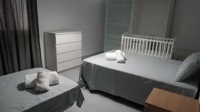 Cama o camas de una habitación en Casa de la abuela