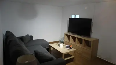 Una televisión o centro de entretenimiento en Casa de la abuela
