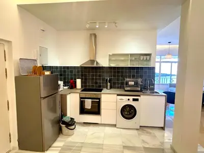 Una cocina o zona de cocina en Amazing new apartment - La Judería
