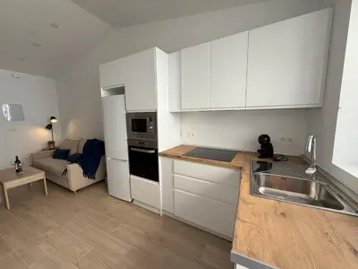 Una cocina o zona de cocina en Escápate al centro de Antequera Casa con patio