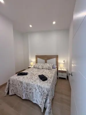 Cama o camas de una habitación en Escápate al centro de Antequera Casa con patio