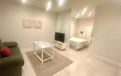 Una televisión o centro de entretenimiento en Almogávares 36 2 Apartamentos