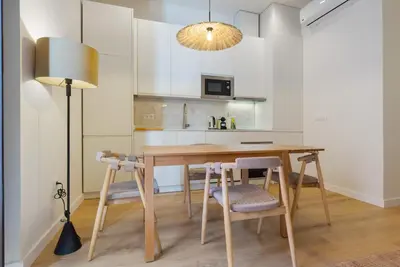 Una cocina o zona de cocina en New stylish - Swimming pool solarium -Feria 23