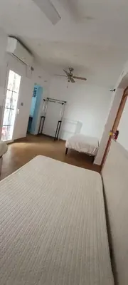 Cama o camas de una habitación en Triana house a 10 min Sevilla y cerca aeropuerto, 5 camas, sofá cama y 2 baños