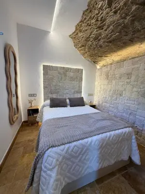 Cama o camas de una habitación en Casa Cueva Transmina 10