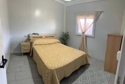 Cama o camas de una habitación en Villa Adán