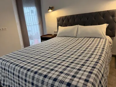 Cama o camas de una habitación en Buen Pastor Studio- Old Town